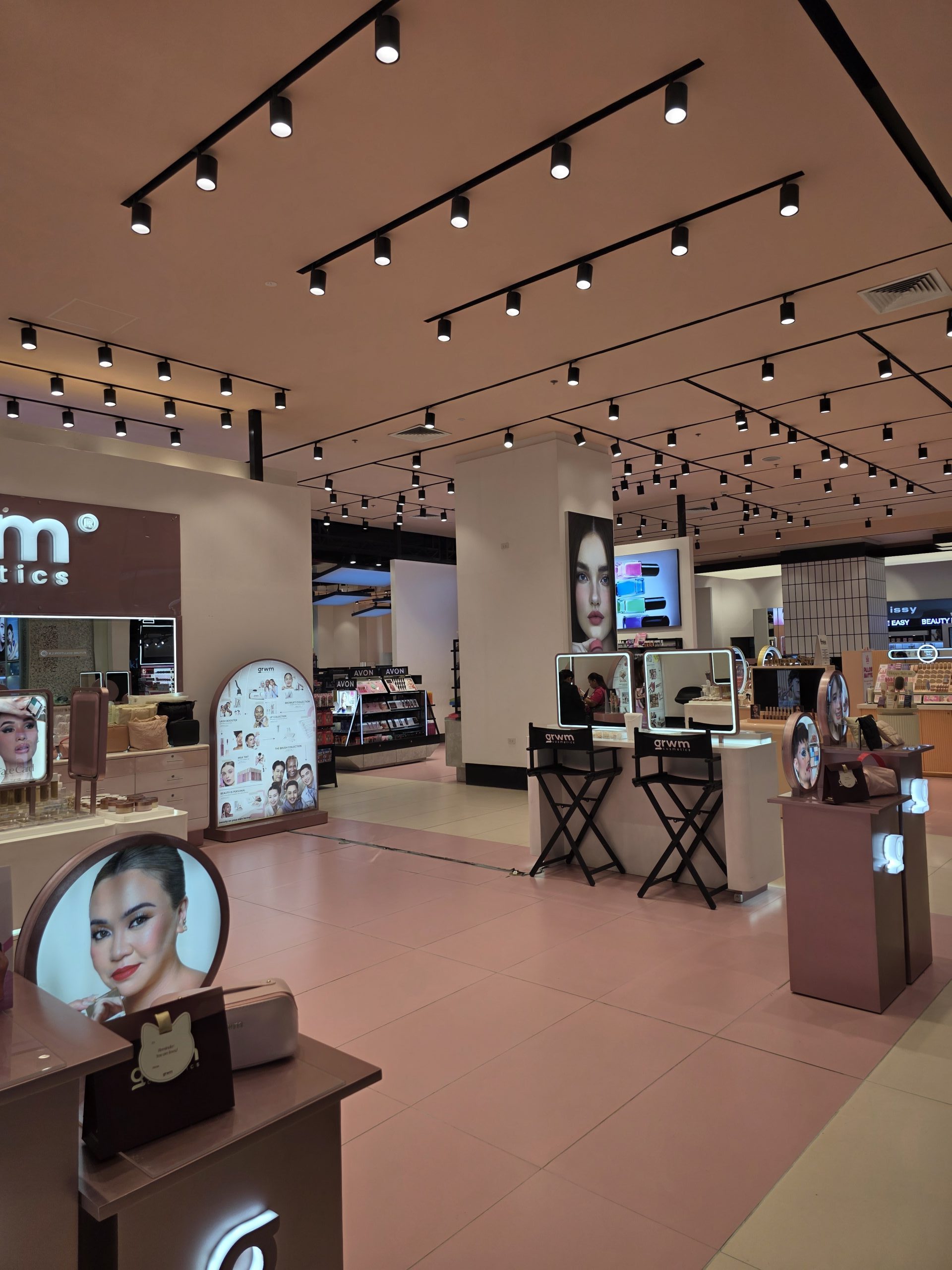 cosmetics retail store lighting using track lights in shopping mall