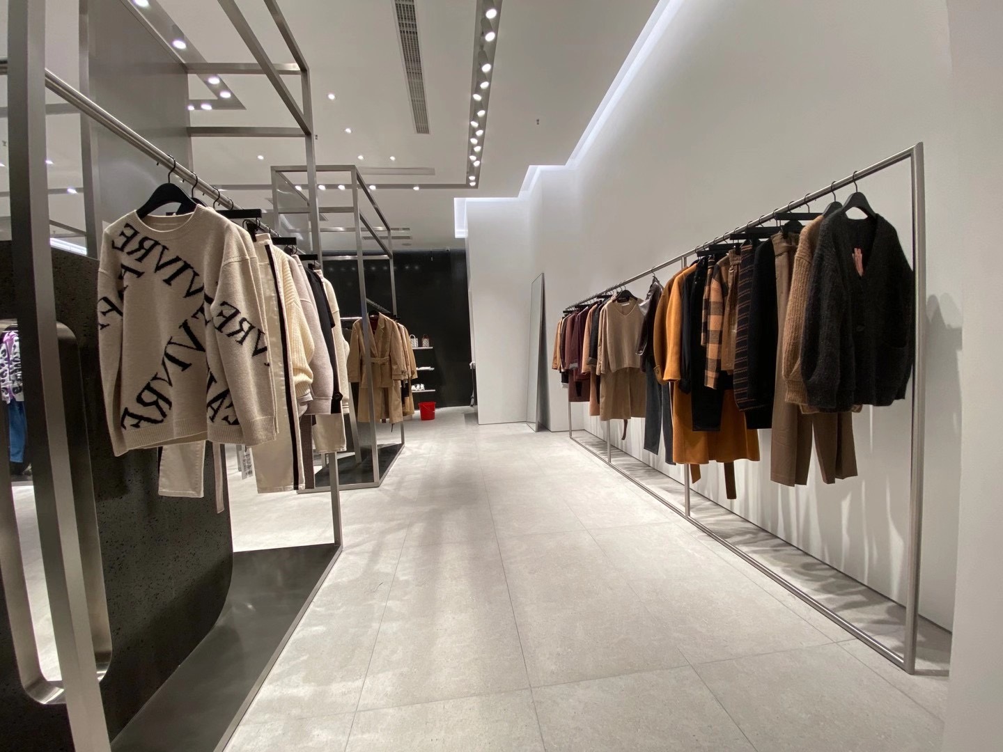 modern retail clothing store lighting with recessed downlights