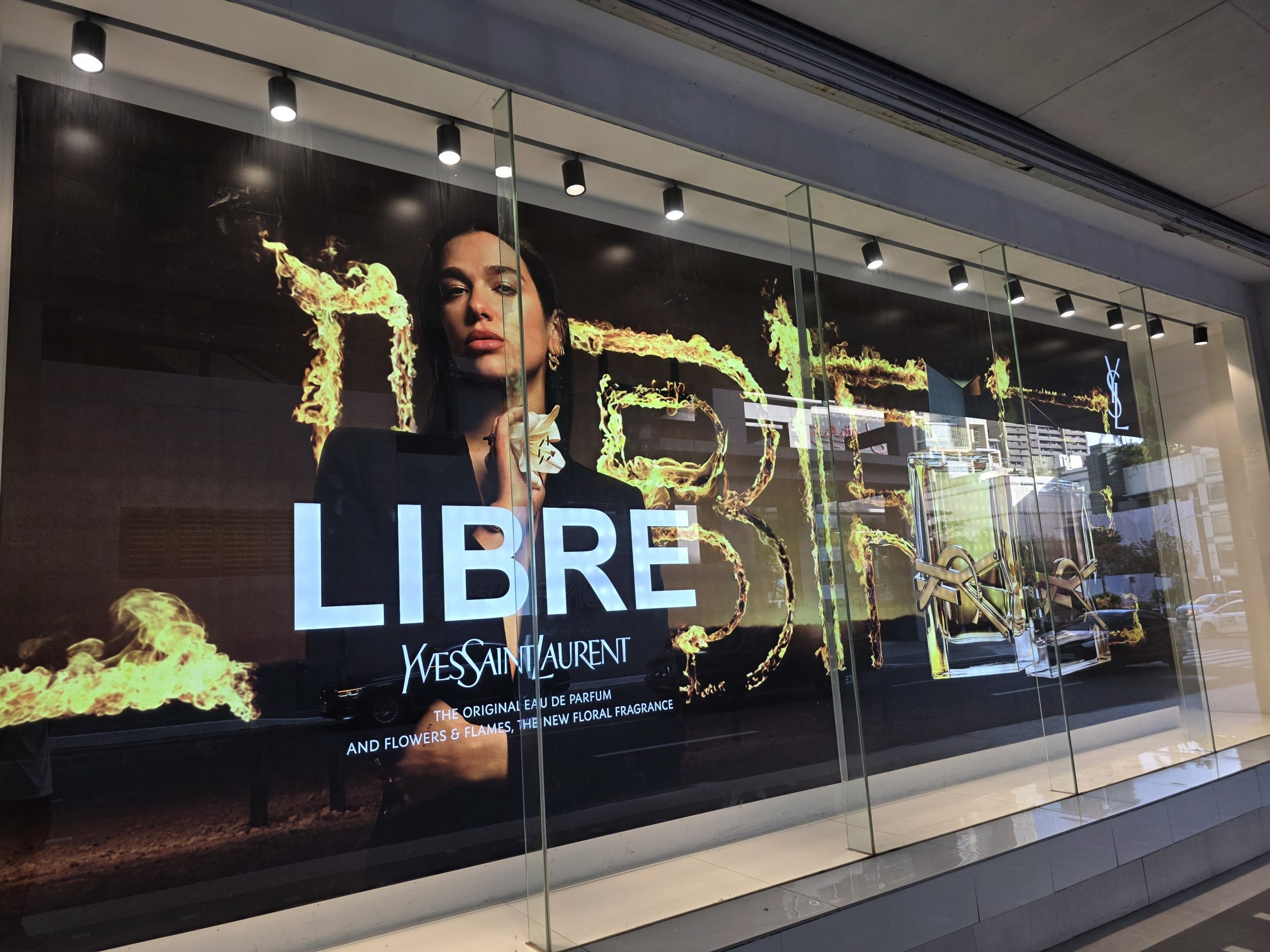 YSL cosmetics display lighting in shopping mall retail store