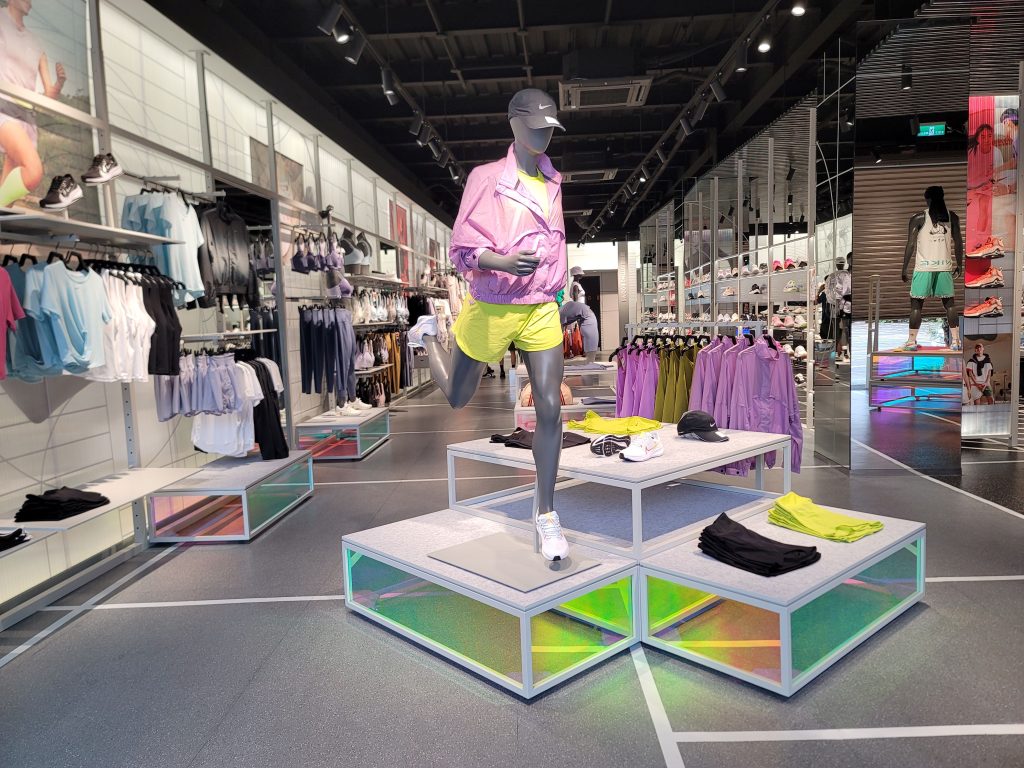 Track lighting spotlight highlighting products in retail store display