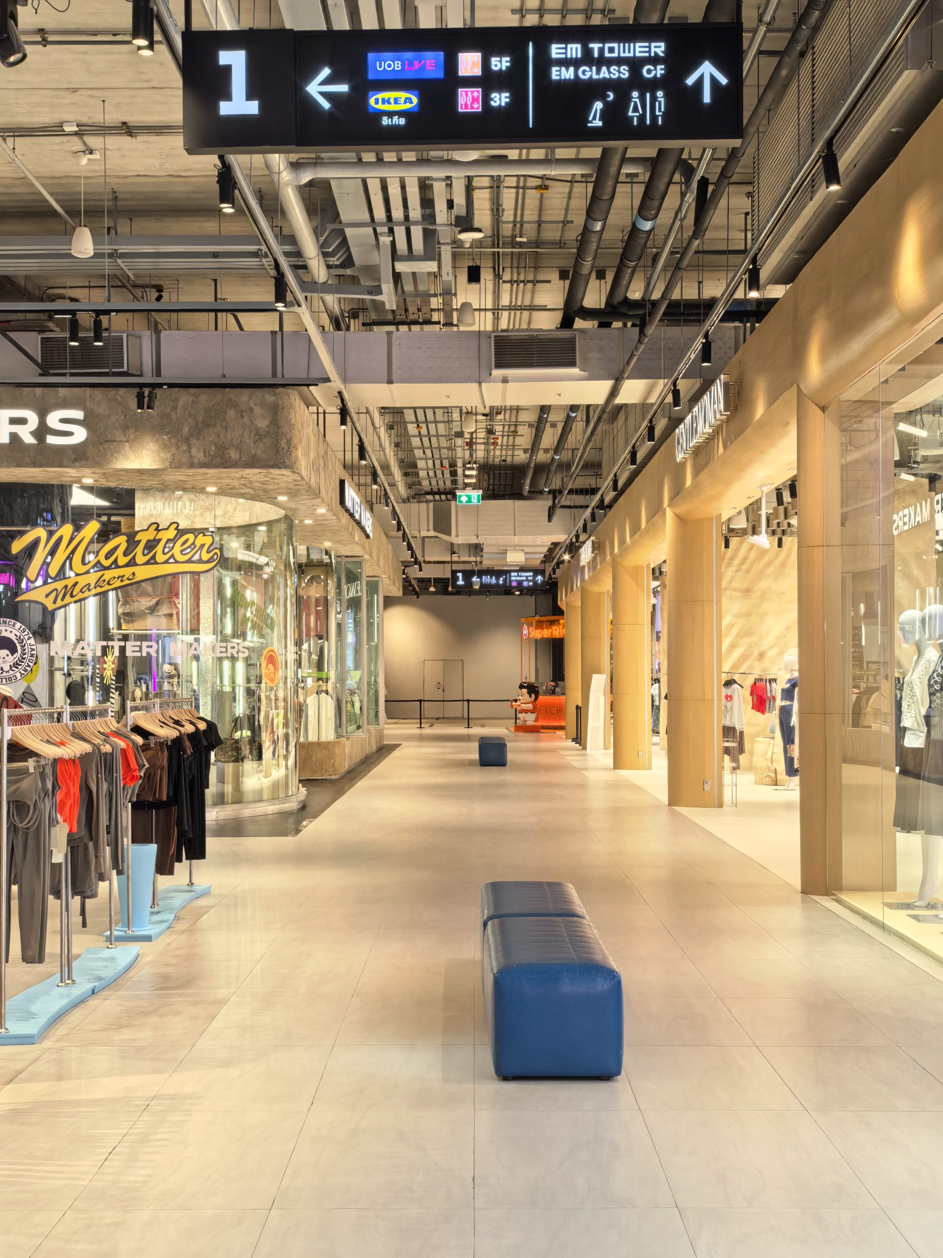 Commercial corridor lighting in Thailand shopping mall with retail stores
